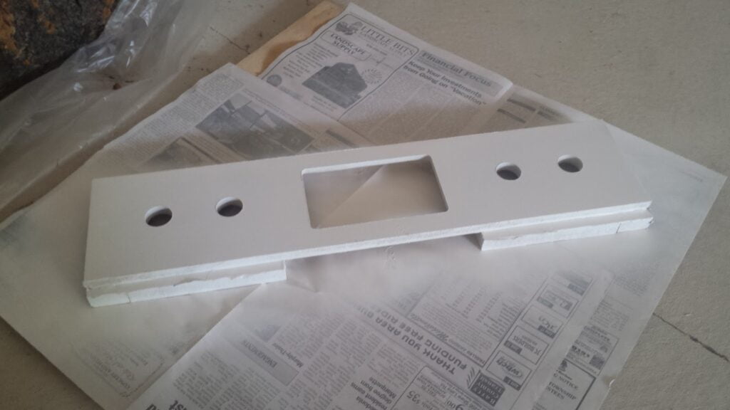 Arcade administration panel with white primer applied