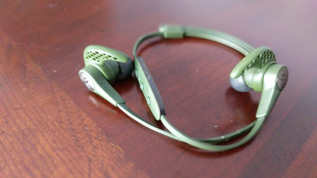 A pair of green Jaybird X3 earbuds