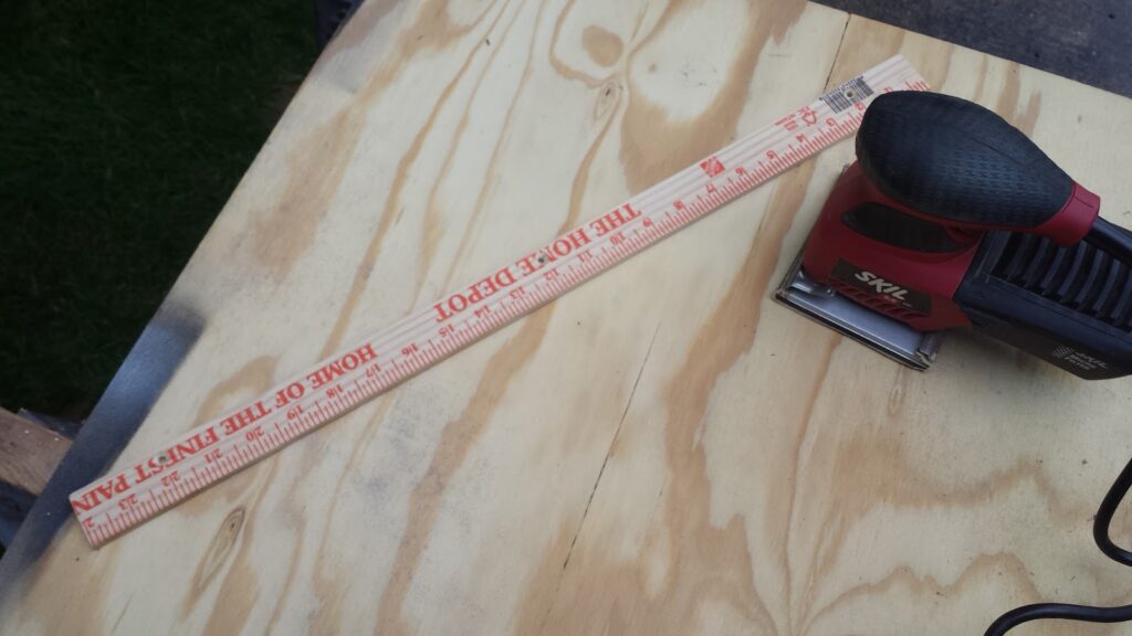 A Home Depot wooden yard stick.
